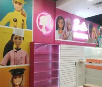 A colorful shop display with empty shelves